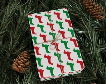 Papier cadeau de Noël teckel : silhouettes de chiens rouges et verts