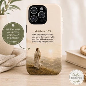 May include: A beige smartphone case featuring a printed illustration of a figure in robes holding a lamb while standing on a hill with a smaller lamb nearby. The text reads Matthew 6:33, Put God first in your life and try to do what is right, and God will take care of everything else you need.