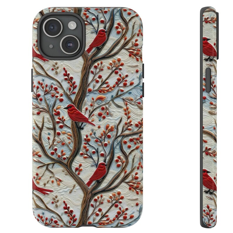 May include: A white phone case with a pattern of red birds and red berries on a tree branch. The case has a raised, textured design.
