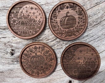 Set of 4 natural Acacia wood coasters with fall pumpkin designs