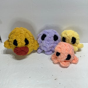 Hand knit octos & duck plushies