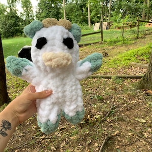 Hand knit plushie cow