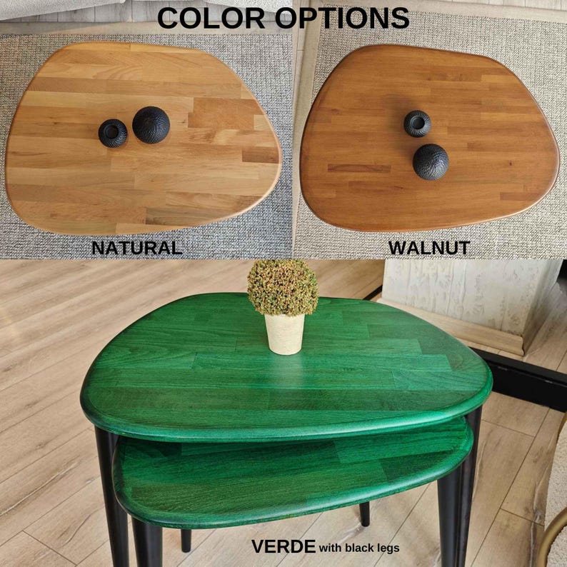 May include: Three coffee tables in different wood finishes: natural, walnut, and green with black legs. The tables are all oval shaped and have a smooth, polished surface.