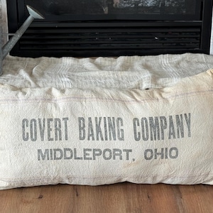 Vintage Grain Sack Lumbar Pillow – Covert Baking Company Advertisement