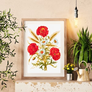 May include: A framed cross-stitch embroidery featuring a bouquet of red poppies, white daisies, and wheat stalks on a white background.