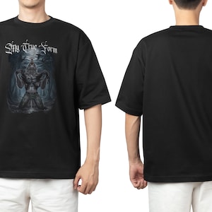 May include: Black t-shirt with a graphic print of a werewolf howling at the moon. The text "My True Form" is printed above the werewolf.