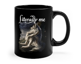 May include: Black ceramic coffee mug with a white wolf illustration and the text "literally me" printed on it.