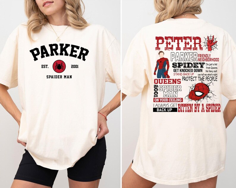 May include: A white t-shirt with a red spider graphic and the text "Parker Est. 2001 Spaider Man" on the front. The back of the shirt has a red spider graphic and the text "Peter Parker Friendly Neighborhood Spidey Get Knocked Down Stand Back Up Queens 2001 Spider Man On Your Ceiling I Always Get Bitten By A Spider Back Up".