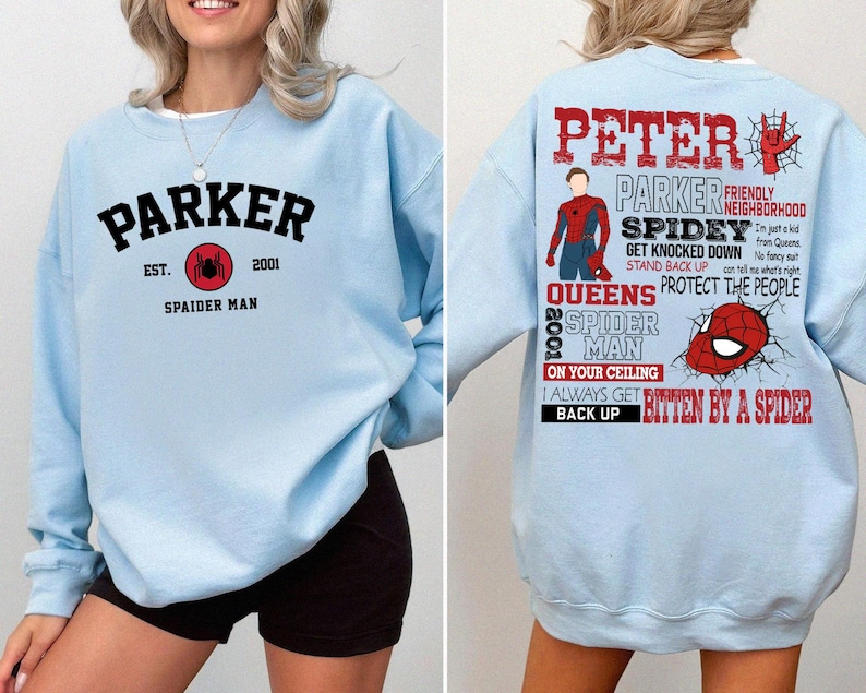 May include: Light blue sweatshirt with a black and red Spider-Man graphic and the text "Parker Est. 2001 Spaider Man" on the front. The back of the sweatshirt has the text "Peter Parker Friendly Neighborhood Spidey Get Knocked Down Stand Back Up Queens 2001 Spider Man On Your Ceiling I Always Get Back Up Bitten By A Spider".