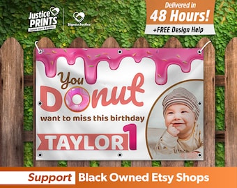 May include: A pink and white birthday banner with the text "You Donut want to miss this birthday Taylor 1". The banner has a pink donut with sprinkles and pink icing dripping down the sides. A baby is pictured in the bottom right corner of the banner.