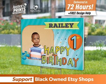 May include: A blue and orange birthday sign with a photo of a child, the name "RAILEY", and the text "1st HAPPY BIRTHDAY".