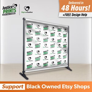 May include: A white backdrop with a repeating pattern of green hearts and the text "Justice Prints" and "Signs of Justice". The backdrop is attached to a black stand. The text "Delivered in 48 Hours! +FREE Design Help" is in the upper right corner of the image. The text "Support Black Owned Etsy Shops" is at the bottom of the image.