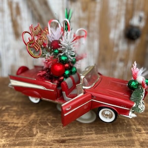 Red Convertible Roadster Celebrates Christmas