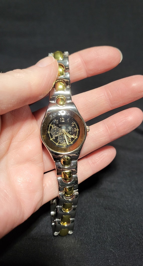 Silver and Gold Toned Geneva Wristwatch w/Stainles