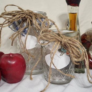 Pair of Alternate Sizes, Decorative Ball Jelly Jars with Raffia Bows and Blank Labels