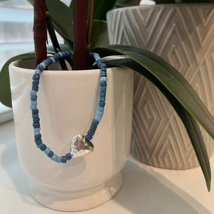 Heart bracelet. Glass seed  beads and metal heart bracelet. Blue and silver heart stretchy bracelet. Boho style bracelet