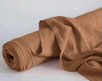 May include: A roll of brown linen fabric. The fabric is soft and has a natural texture.