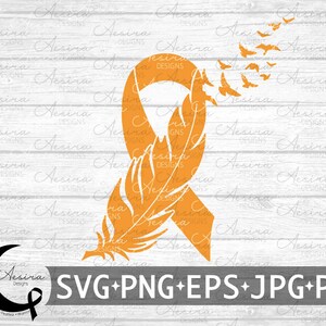 Puede incluir: Cinta naranja con un diseño de pluma y una bandada de pájaros volando. La cinta es un símbolo de apoyo y esperanza. El diseño está sobre un fondo de madera blanca.