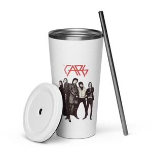 May include: White stainless steel tumbler with a black and white image of the band The Cars. The band's name is in red letters. The tumbler has a white lid and comes with a silver straw.