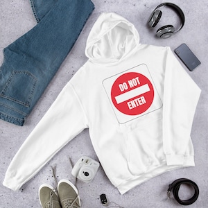 May include: White hooded sweatshirt with a red and white "Do Not Enter" sign printed on the front.