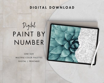 May include: Digital download of a paint by number image of a succulent plant on a tablet screen. The image is in black and white with numbered sections. The text "Digital Paint By Number" is visible on the screen.