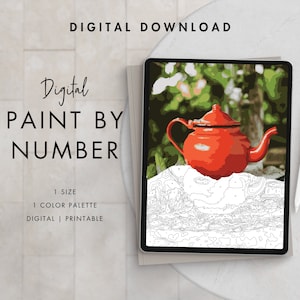 May include: Digital paint by number image of a red teapot on a stone surface with a green background. The image is on a tablet screen with a stylus next to it. The text "Digital Paint By Number" is on the screen.