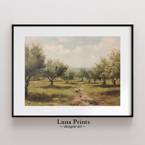 May include: A framed painting of a landscape with a dirt path leading through a field of trees. The trees are green and the sky is blue with white clouds. The painting is in a black frame.