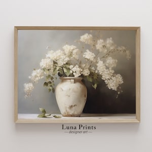May include: A painting of a white ceramic vase filled with white flowers. The vase has a rustic, aged look and the flowers are arranged in a loose, natural style. The background is a soft blue.