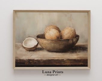 May include: A framed still life print featuring a wooden bowl filled with coconuts. One coconut is halved, revealing the white interior. The artwork has a neutral color palette with brown and beige tones, and the text "Luna Prints - designer art -" is at the bottom.