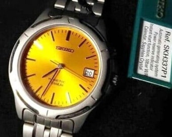 SEIKO V145-0AX0 Solar Titanium Men's Watch With Navy Dial