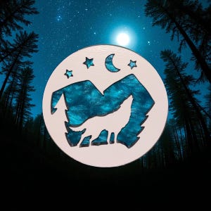 May include: White circular wooden coaster featuring a wolf silhouette, mountains, stars, and a crescent moon design. The mountains and background are filled with shimmering blue resin. The coaster is set against a night sky backdrop with trees.