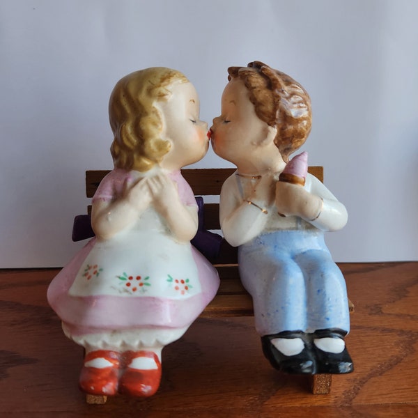 Cute Wales Kissing Couple on a Bench Salt and Pepper Shakers Very good vintage condition Romantic Mid century  All pieces have Wales sticker