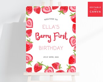 Könnte beinhalten: Willkommen zu Ellas Berry First Birthday, ein weißes Schild mit rotem und rosa Text, umgeben von einem Rand aus roten Erdbeeren.