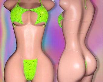 May include: A neon green two-piece swimsuit with rhinestones. The top has a halter style with a cut-out design. The bottom is a thong style with a low rise.
