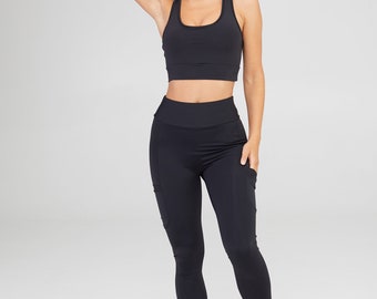 Sportset "Aktasport Drive Schwarz" . Leggings mit Taschen und Oberteil für verschiedene Sportarten und Yoga.