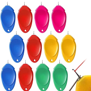 May include: Set of ten colorful thread spool threaders, each with a small hook at the top. The threaders are in red, pink, blue, yellow, and green.