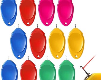 May include: Set of ten colorful thread spool threaders, each with a small hook at the top. The threaders are in red, pink, blue, yellow, and green.
