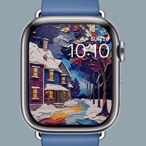 Op de afbeelding: Een blauwe Apple Watch met een geschilderd winterlandschap als wijzerplaat. De tijd is 10:10 en de datum is ZON 26.