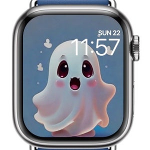 May include: A blue leather band Apple Watch with a white ghost cartoon on the screen. The time is 11:57 and the date is SUN 22.