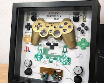 Gold PlayStation 2 controller frame