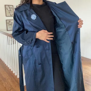 May include: A rustic wooden sign with the text "Welcome to our home" in a handwritten style. The sign features a distressed finish and a simple, inviting design, perfect for a front porch or entryway.