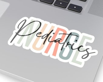 May include: A sticker with the words "NURSE Pediatrics" in a colorful rainbow font on a silver laptop.
