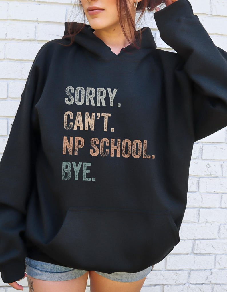 May include: Black hooded sweatshirt with the text "SORRY. CAN'T. NP SCHOOL. BYE." in a vintage style font.