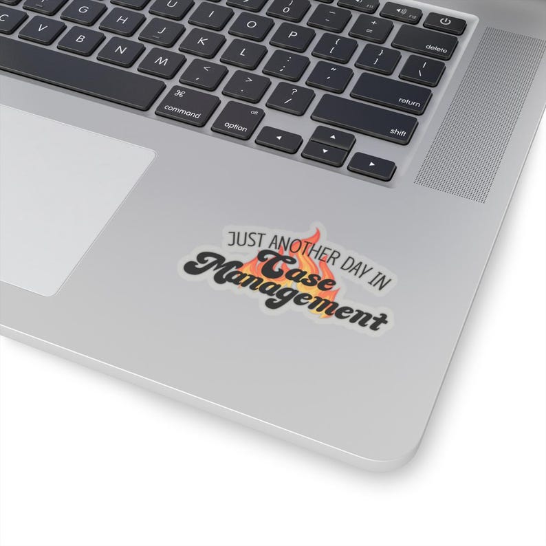 May include: A sticker with a retro design that says "Just another day in Case Management" with a flame graphic behind the text.
