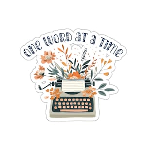 May include: A vintage typewriter with a floral arrangement of orange, yellow, and green flowers. The text "one word at a time" is written in a blue and white font above the typewriter.