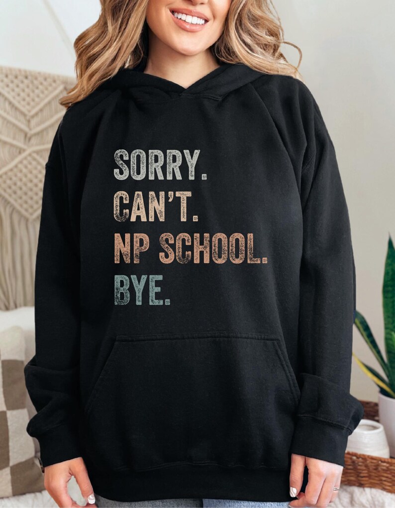 May include: Black hooded sweatshirt with the text "SORRY. CAN'T. NP SCHOOL. BYE." in a vintage style font.