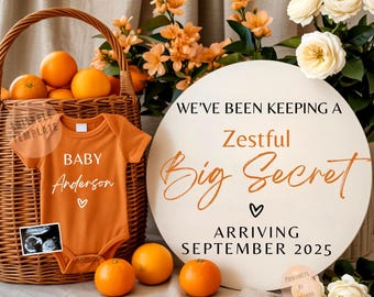 Op de afbeelding: Een oranje babyromper met de tekst "BABY Anderson" en een hartsymbool, naast een mand met sinaasappels en een bord met de tekst "WE'VE BEEN KEEPING A Zestful Big Secret ARRIVING SEPTEMBER 2025". De afbeelding bevat bloemen.