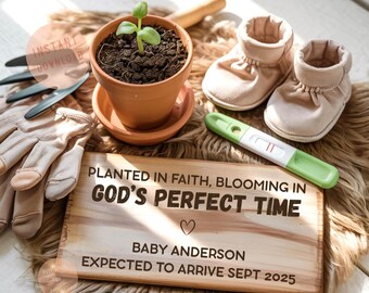 May include: A terracotta pot with a small plant, baby booties, a positive pregnancy test, gardening gloves, and a wooden sign that reads "Planted in Faith, Blooming in God's Perfect Time." The sign also includes the baby's name and expected arrival date.