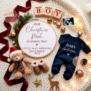 May include: A festive baby announcement with a navy blue onesie, a teddy bear in a Santa hat, and a framed embroidery hoop with text. The text reads "Our Christmas Wish is Coming True" and "Little Man Arriving December 2025".