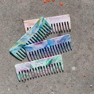 Wide tooth comb made from recycled plastic